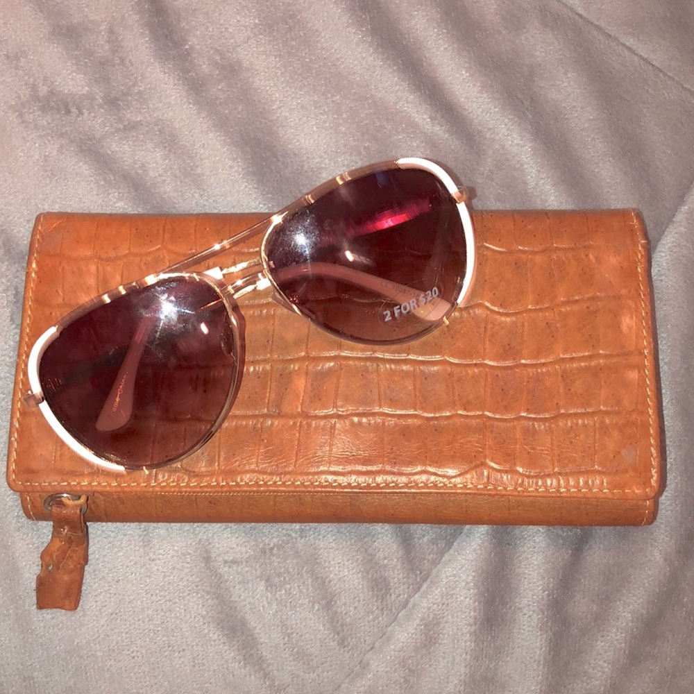 Buckles sunglass and a wallet
